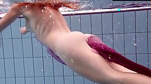 Smoking hot Russian redhead in the pool