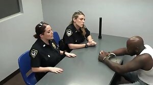 Perverted milf cops subdue a big black horny dude into stuffing their cunts