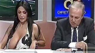 Italian woman flashes her giant tits on TV show