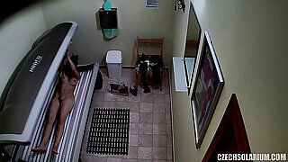 Shaved and Tight Pussy Caught in Solarium